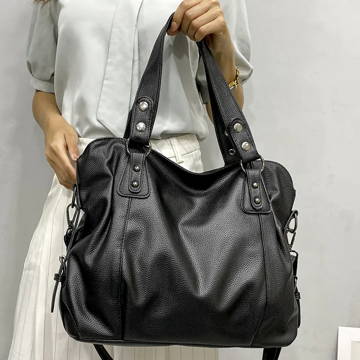 Sac à main quotidien en cuir souple pour femme, alliant style, confort et fonctionnalité.