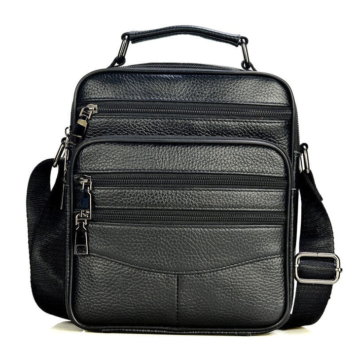 Élégant sac homme en cuir véritable avec plusieurs compartiments zippés. Parfait pour le travail ou les voyages.