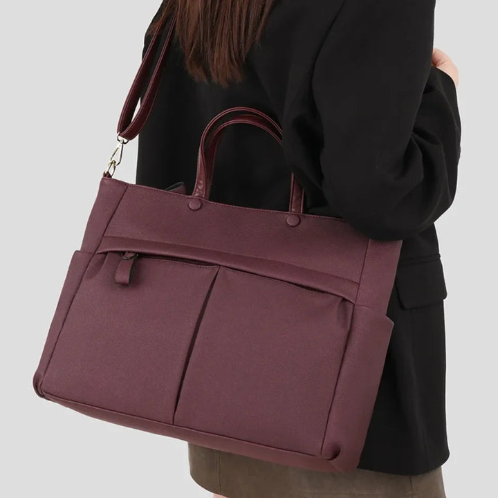 Grand sac cabas Élise noir pour femme, organisé, conçu pour transporter un ordinateur.