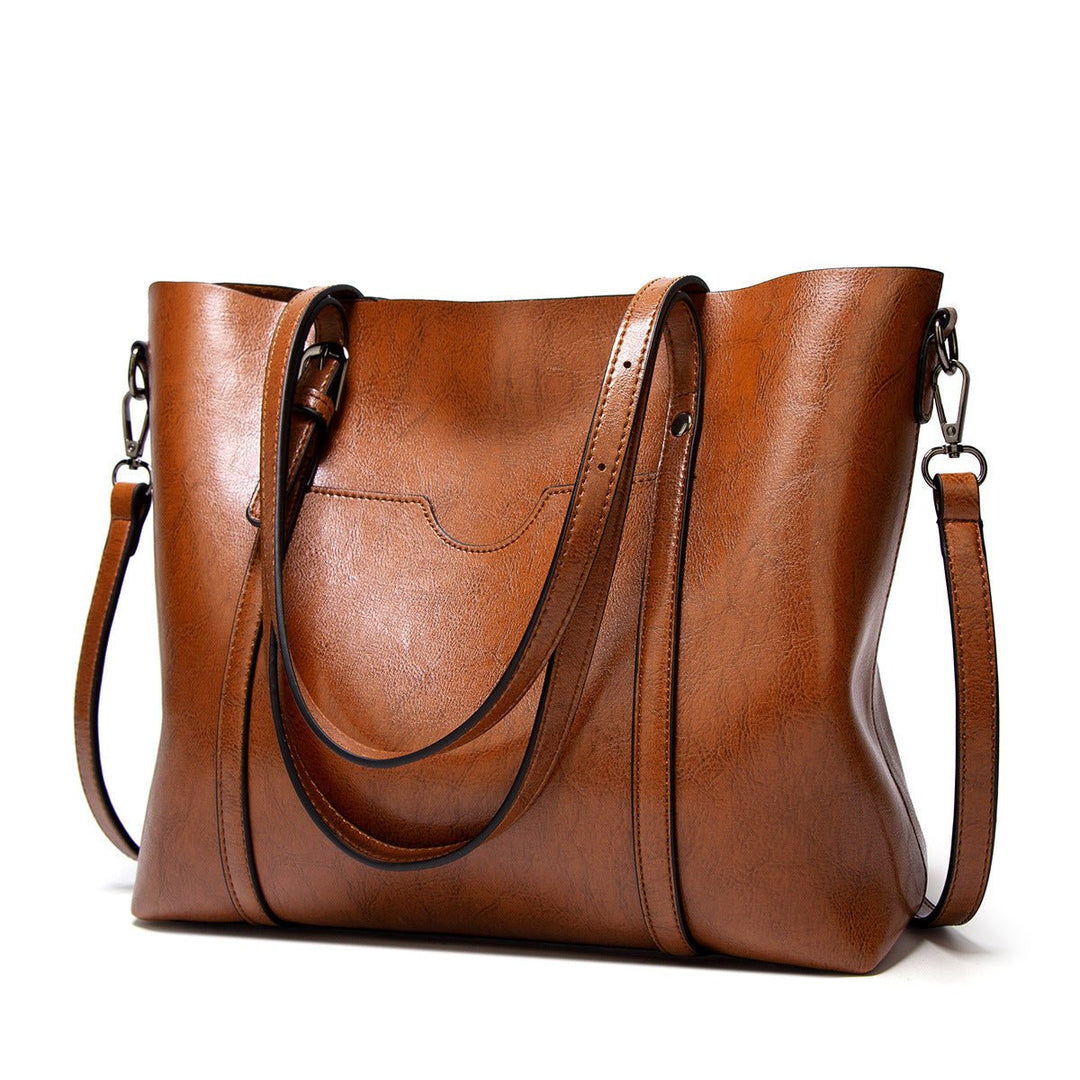 Sac cabas femme en cuir, grand sac de travail élégant et fonctionnel pour bureau et quotidien.