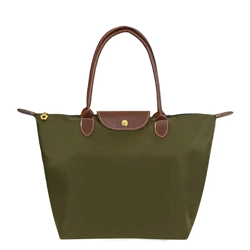 Fourre-tout de voyage pliable léger pour femme, sac cabas pratique et stylé pour une organisation facile.