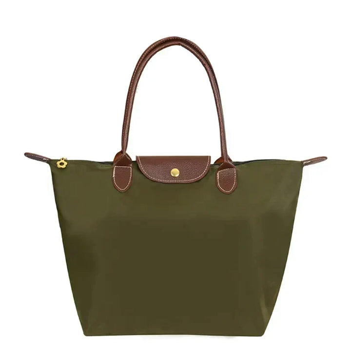 Fourre-tout de voyage pliable léger pour femme, sac cabas pratique et stylé pour une organisation facile.