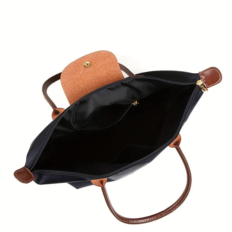Sac cabas femme pliable, chic et pratique, compagnon idéal pour le quotidien, les sorties et le voyage.