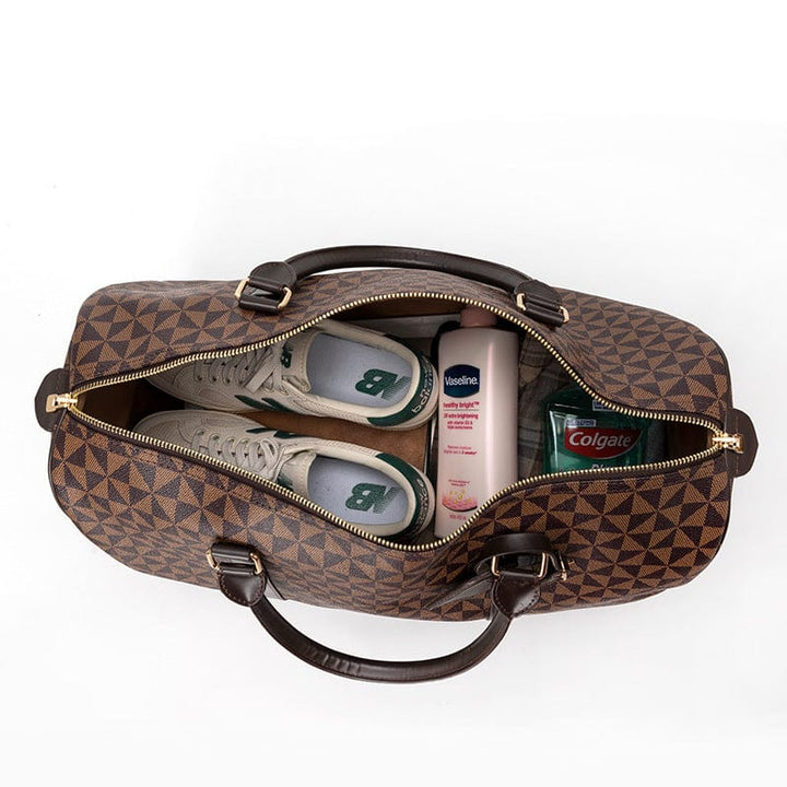 Sac de voyage femme moderne en cuir PU, élégant et tendance pour week-end. Grand sac chic, accessoire de mode.