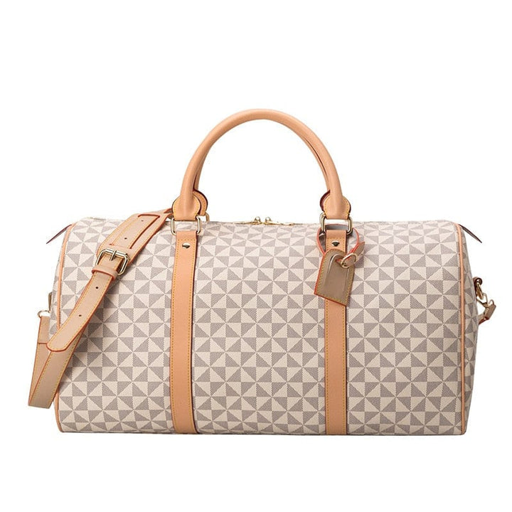 Élégant sac de voyage pour femme en cuir PU noir, parfait pour week-end. Bagage cabine mode et résistant.