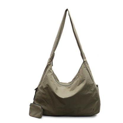 Sac à main hobo polyvalent, style décontracté chic, accessoire mode femme tendance.