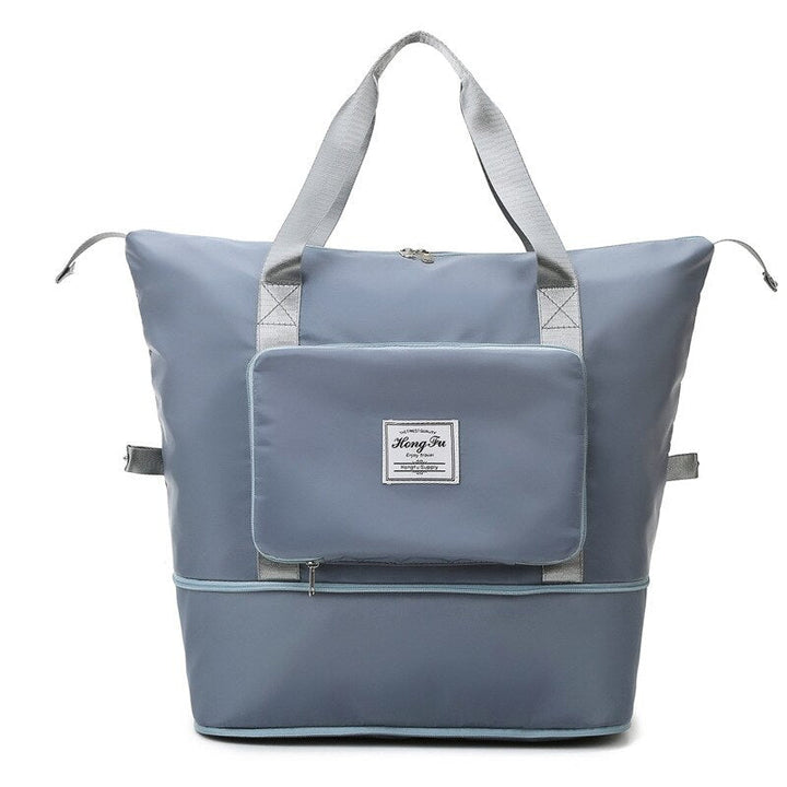 Sac de voyage femme imperméable et extensible, parfait pour le week-end ou la salle de sport.