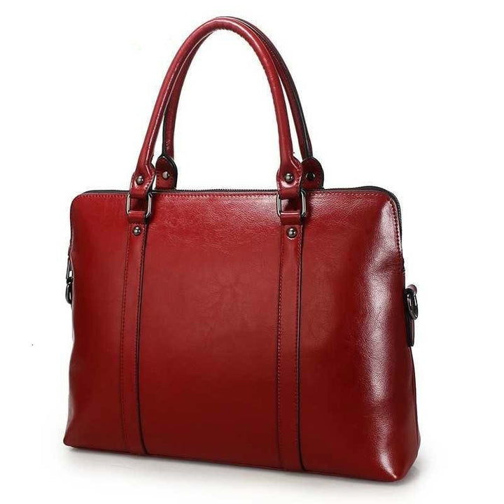 Sac ordinateur femme en cuir élégant, idéal pour documents, travail et usage professionnel au bureau.