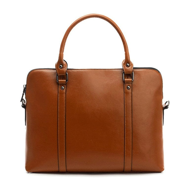Sac à main professionnel pour femme, en cuir élégant, parfait pour transporter un ordinateur portable au bureau.