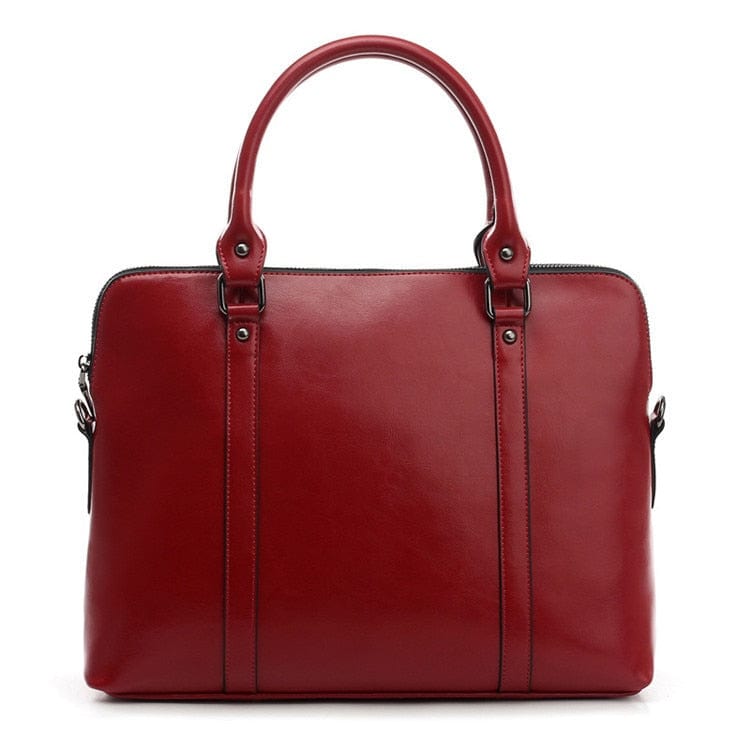 Sac en cuir véritable marron pour femme, un accessoire de bureau chic et un porte-ordinateur élégant.