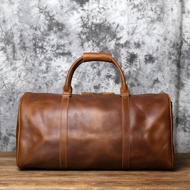 Sac de voyage homme Côme en cuir véritable. Accessoire élégant et fonctionnel pour le voyageur moderne.