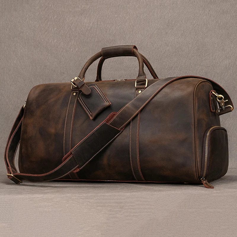 Sac de voyage business homme en cuir couleur café, parfait pour les voyages professionnels.
