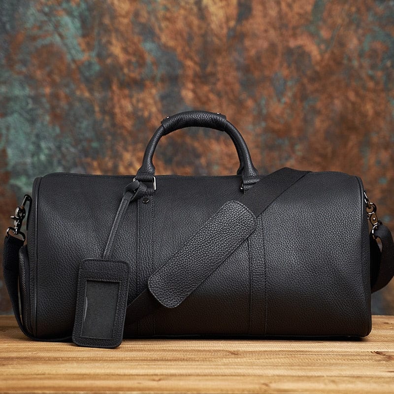 Sac de voyage homme élégant en cuir véritable marron, format cabine, pour week-end ou business.