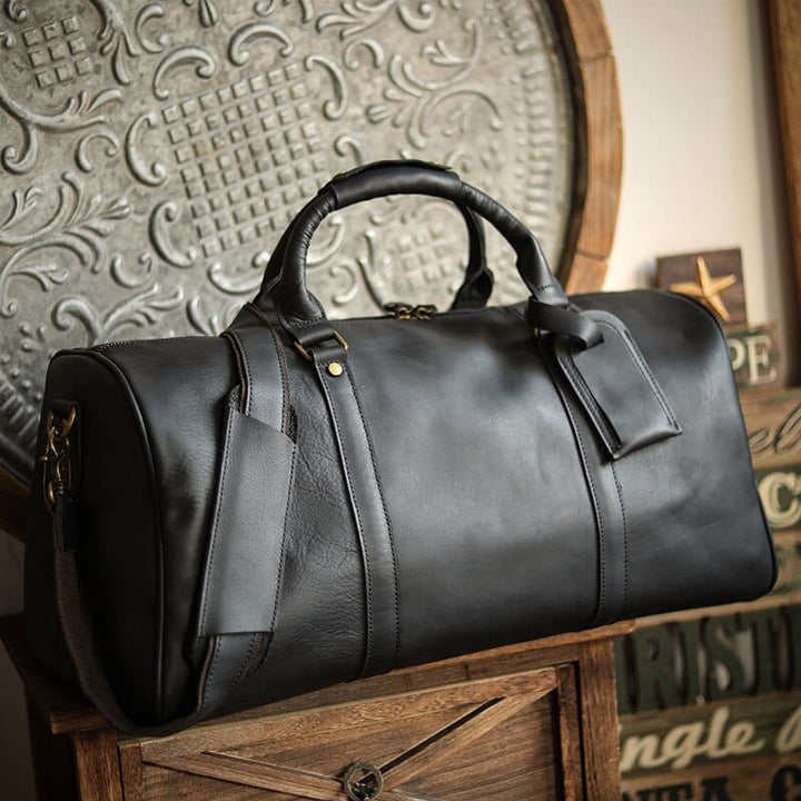 Sac de voyage homme Kaïs en cuir marron vintage, idéal week-end. Robuste, stylé et parfait comme bagage cabine.