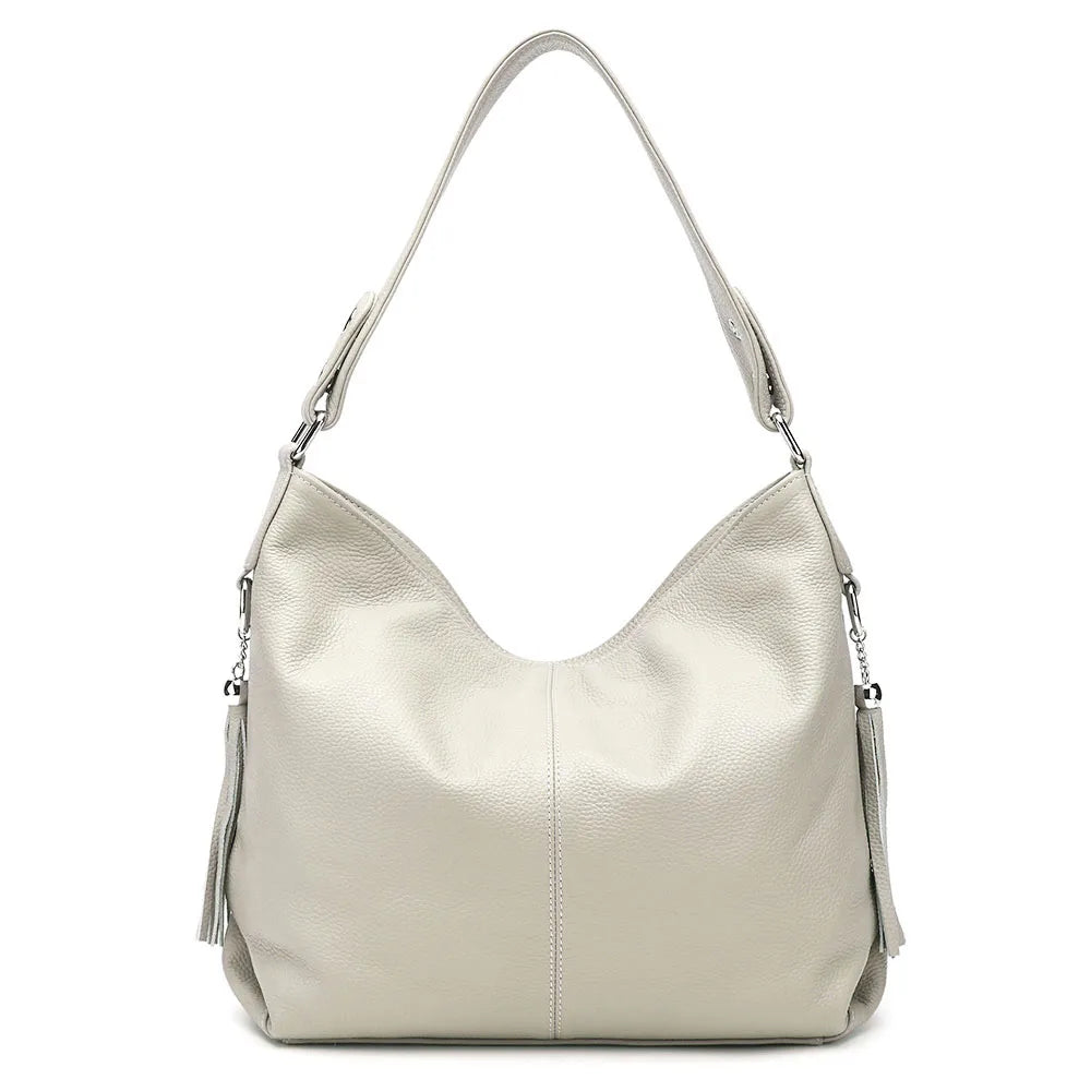 Sac à main grand format pour femme active, design sophistiqué et grande capacité.