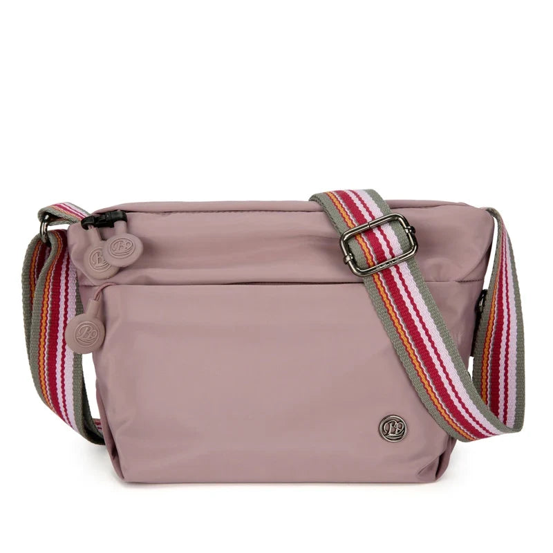 Sacoche de voyage anti-vol pour femme, résistante à l'eau, accessoire sécurité indispensable.