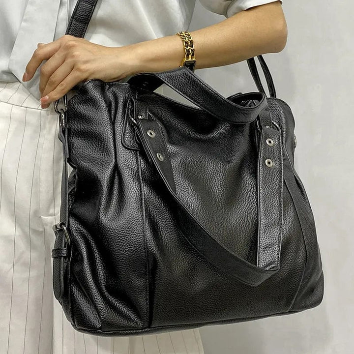 Sac femme polyvalent en cuir souple, chic, grande capacité, pour toute occasion.