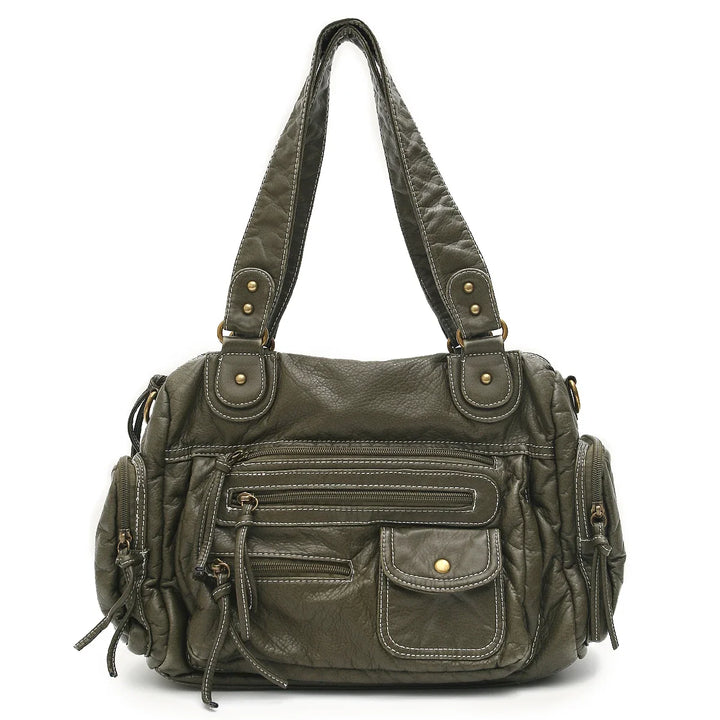 Sac cabas femme vintage spacieux pour transporter l'essentiel. En similicuir, avec une bandoulière confortable.