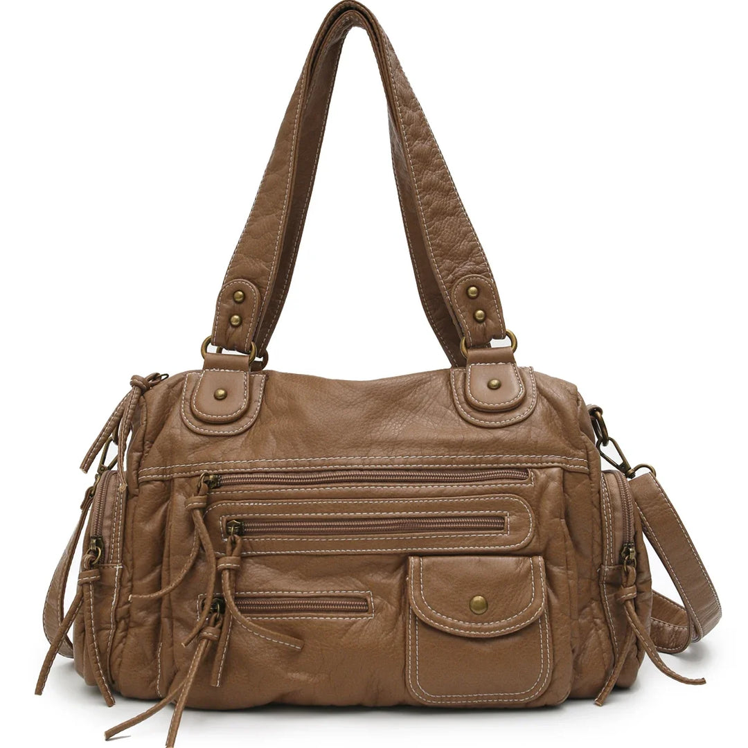 Sac cabas femme vintage en similicuir marron, spacieux et élégant, avec bandoulière pour le quotidien.