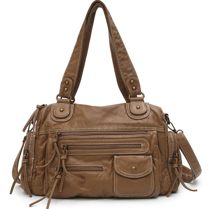 Sac cabas femme vintage en similicuir marron, spacieux et élégant, avec bandoulière pour le quotidien.