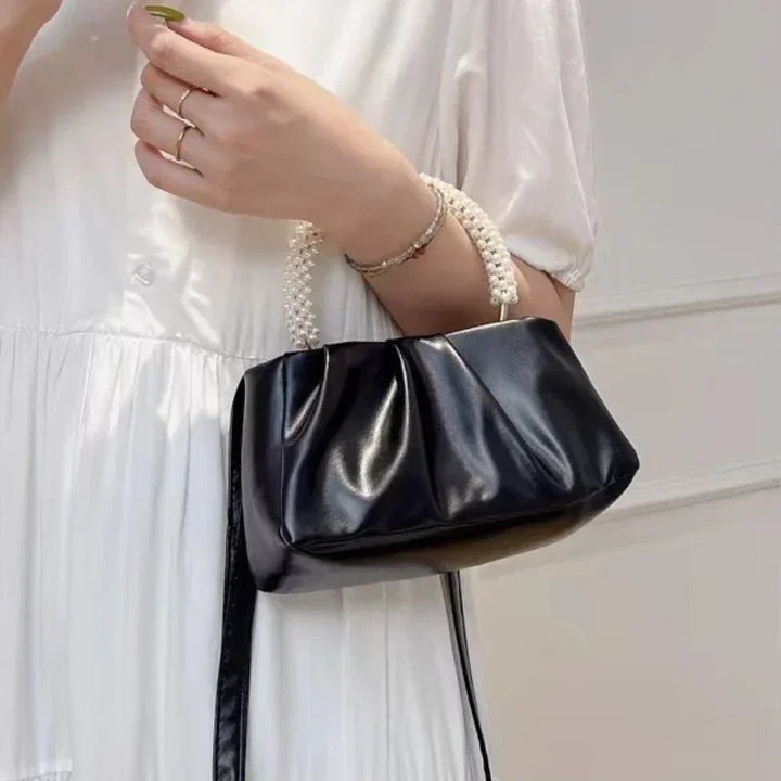 Idée cadeau femme: petit sac de soirée élégant, parfait pour toute occasion spéciale.