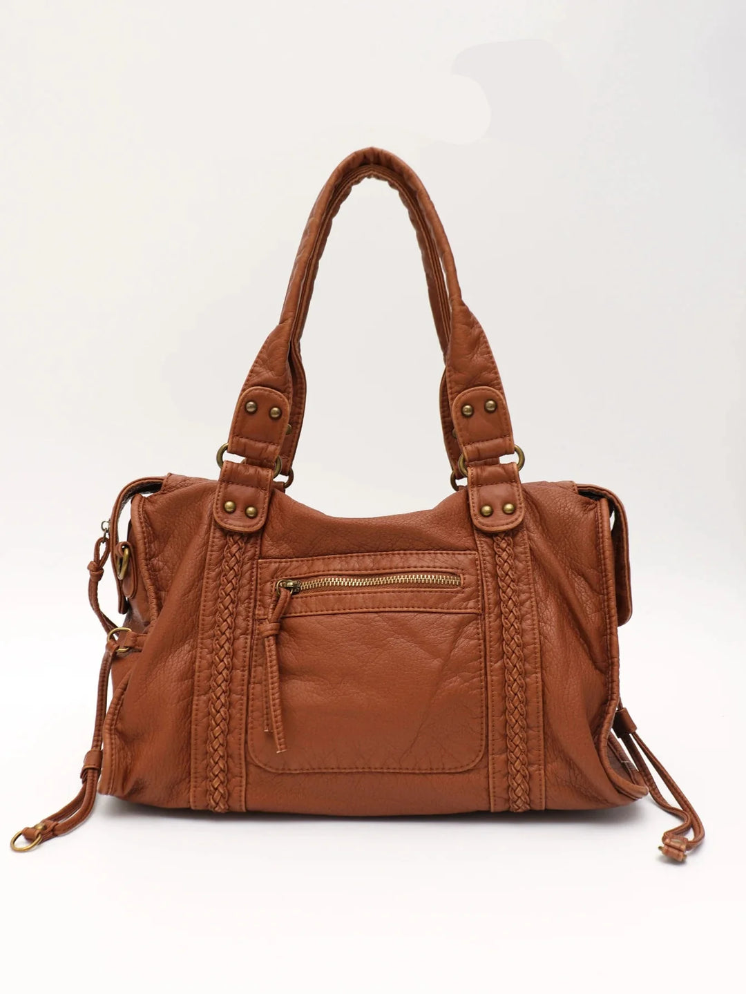 Sac de cours femme élégant, posé sur bureau, style tote bag similicuir, polyvalent pour le lycée.