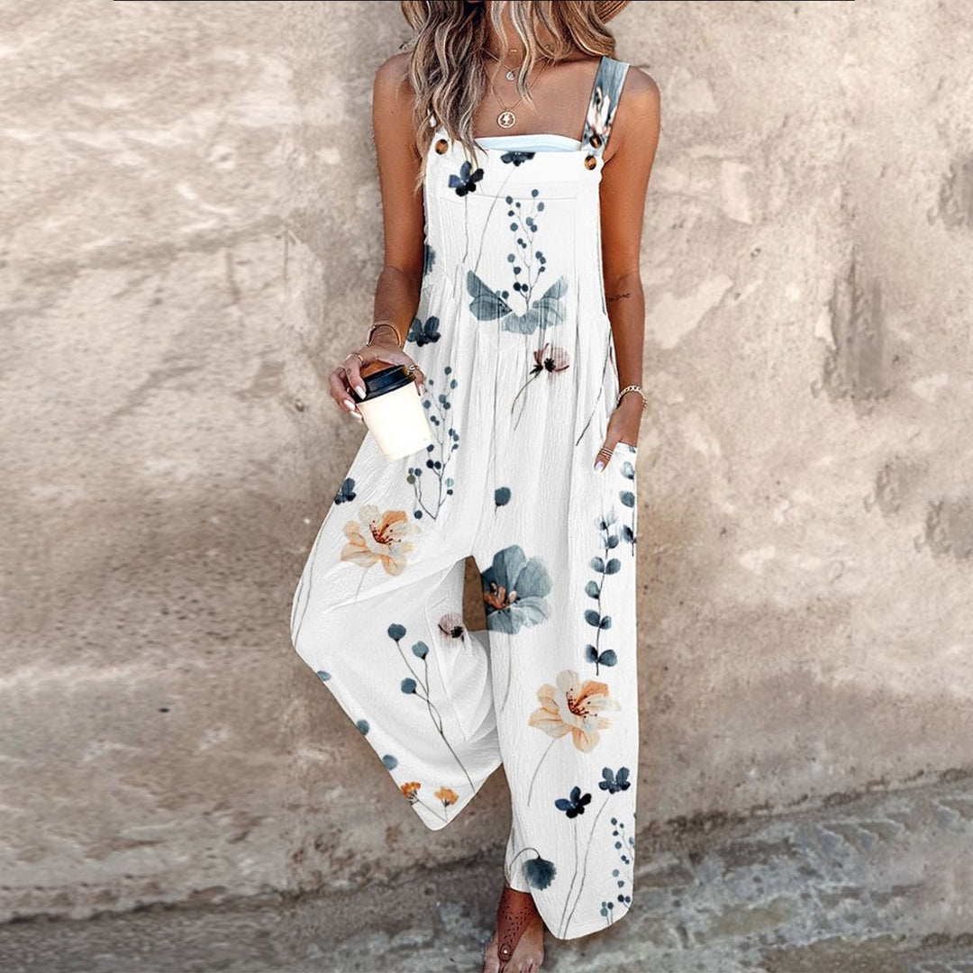 Modèle tendance de salopette femme à motifs imprimés, bretelles ajustables, parfaite pour un look estival.