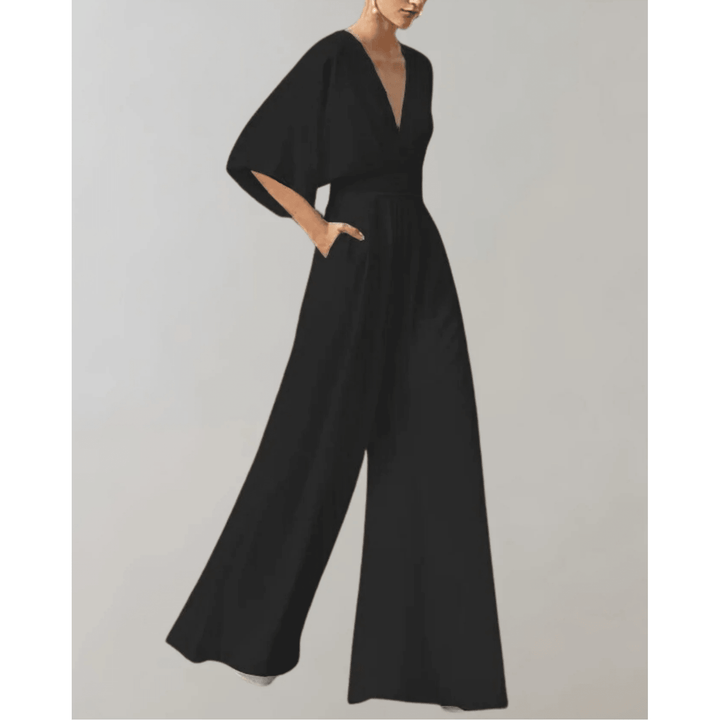 Salopette femme moderne à jambes larges, taille haute. Style chic et fluide, idéale pour un confort moderne.