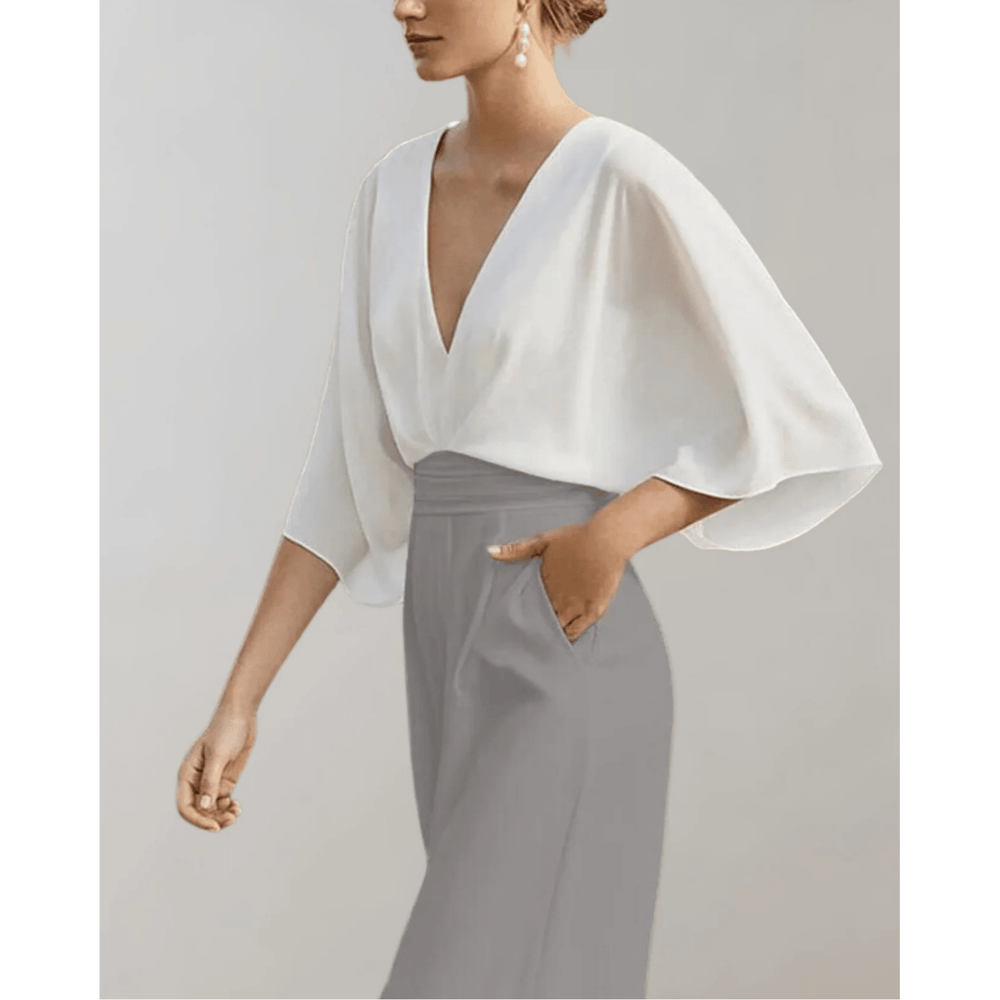 Combinaison femme taille haute confortable, jambes larges. Tenue chic et polyvalente, parfaite pour le style moderne.