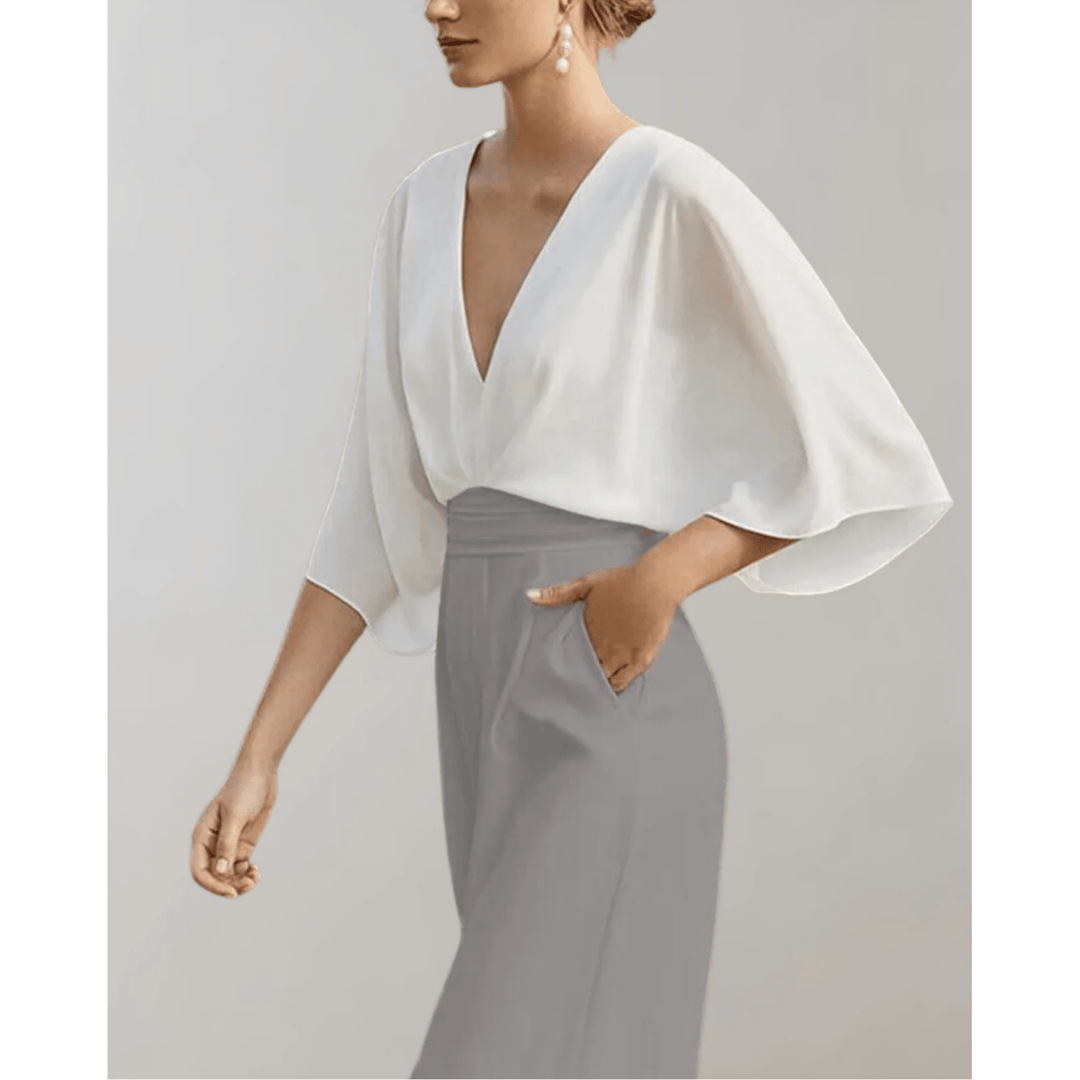 Combinaison femme taille haute confortable, jambes larges. Tenue chic et polyvalente, parfaite pour le style moderne.