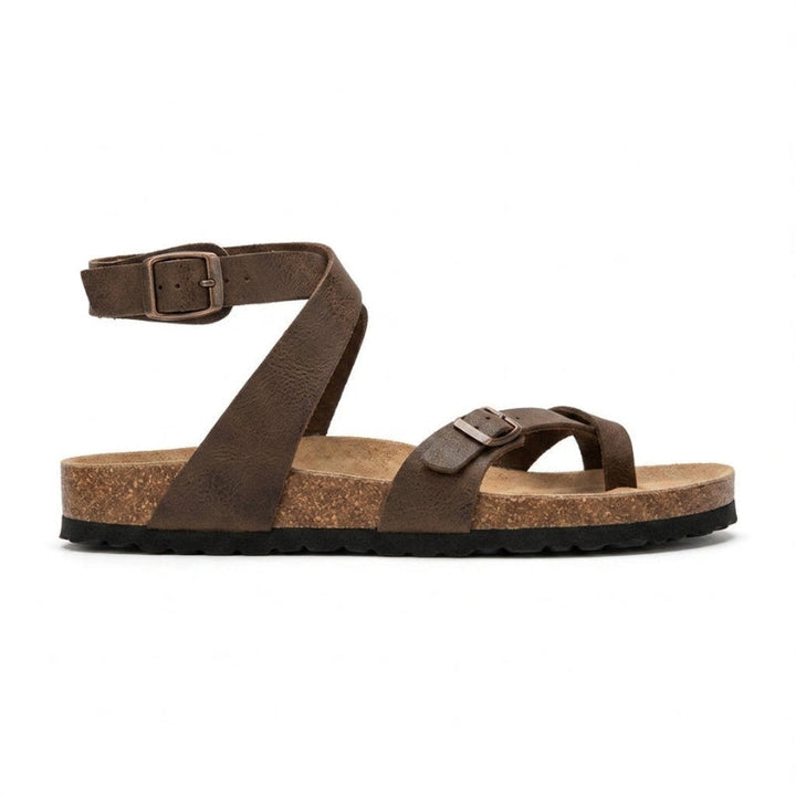 Sandales plates femmes avec sangles réglables. Offrent un ajustement précis, confort et mode pour l'été.