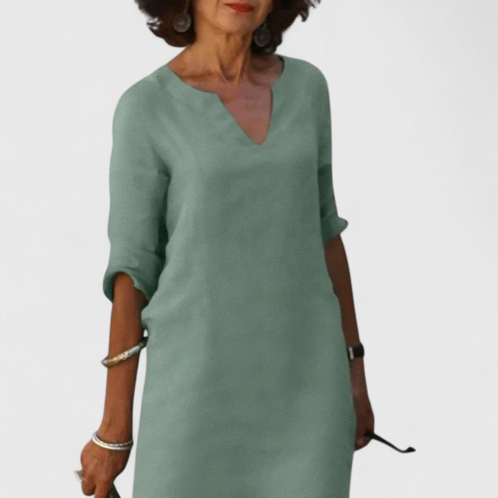 Superbe robe femme à col V, très confortable, pour un style mode élégant et décontracté.