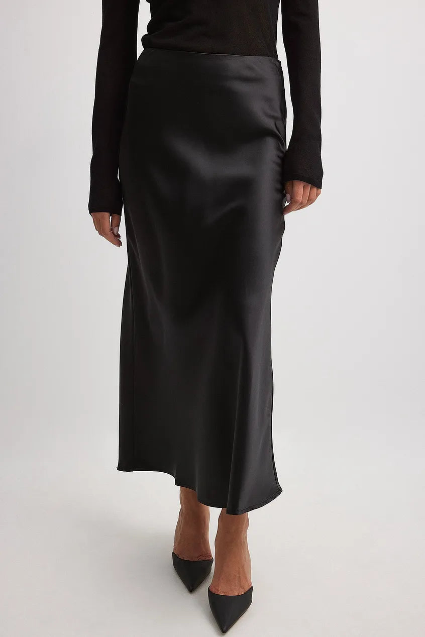 Tendance: jupe satinée fluide, élégante et confortable pour femmes modernes.