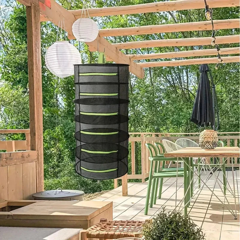 Filet de séchage pliable multicouche, maximise l'espace pour sécher herbes, fruits et légumes efficacement.