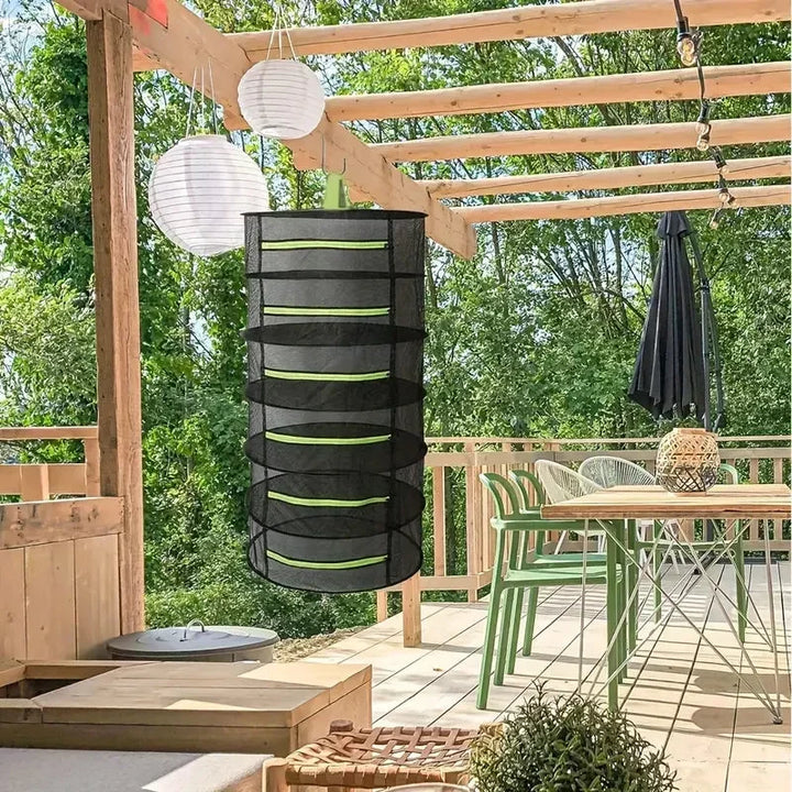 Filet de séchage pliable multicouche, maximise l'espace pour sécher herbes, fruits et légumes efficacement.