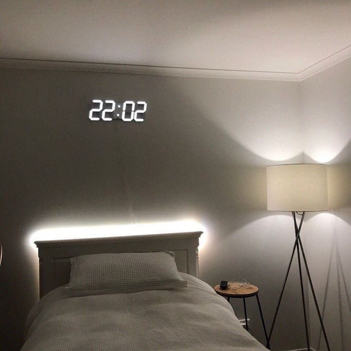 Horloge murale LED 3D au design moderne, idéale pour une ambiance lumineuse ajustable dans votre maison.