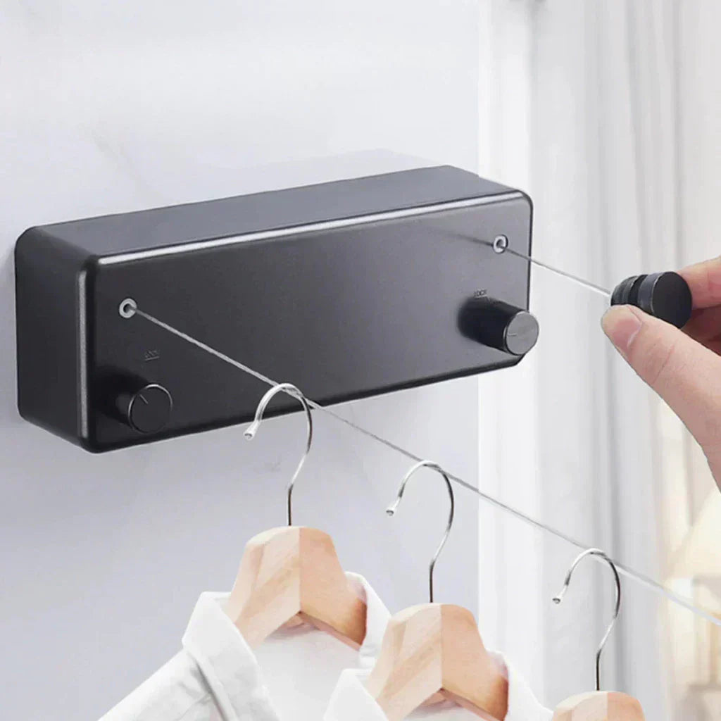 Corde à linge extensible murale FlexDry en inox pour séchage intérieur/extérieur, très gain de place.