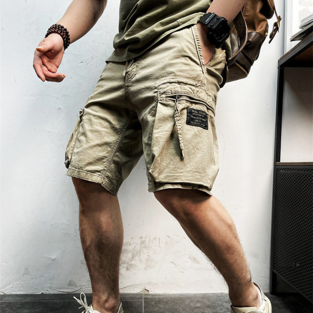 Short cargo homme noir, style décontracté, idéal pour l'été et les activités quotidiennes avec confort.