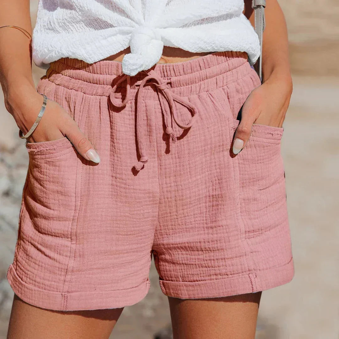 Short femme confortable et léger, parfait pour l'été. Style décontracté et polyvalent avec taille élastiquée.