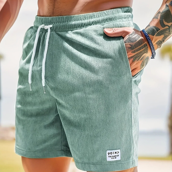 Short d'été décontracté homme, coupe ample et taille élastique à cordon pour un style relax.