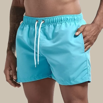 Short de bain homme respirant, tissu séchage rapide, indispensable pour l'été actif.