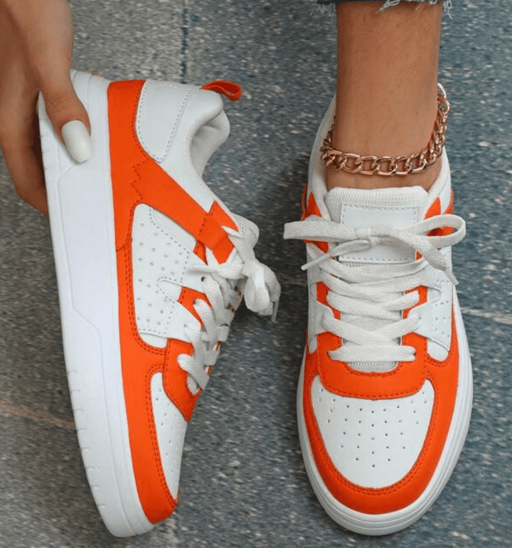 Collection de sneakers femmes à lacets, tendance et confortables, idéales pour un look mode sans effort.