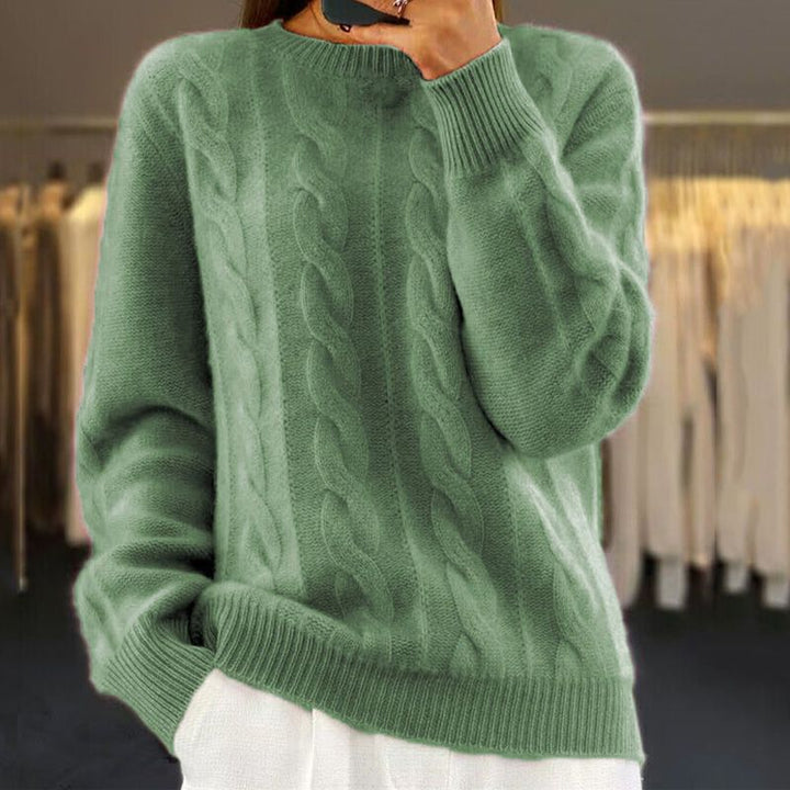 Pull femme torsadé en maille de haute qualité, élégant et chaud pour le froid. Confort féminin assuré.