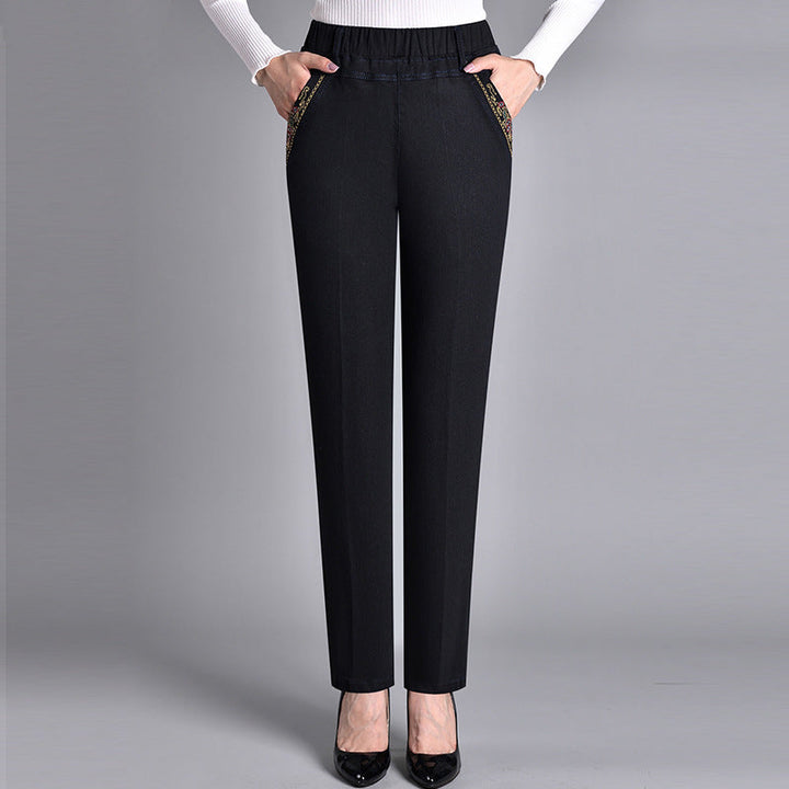 Pantalon jean femme décontracté, coupe droite ajustée, taille élastique. Confort supérieur pour style moderne.