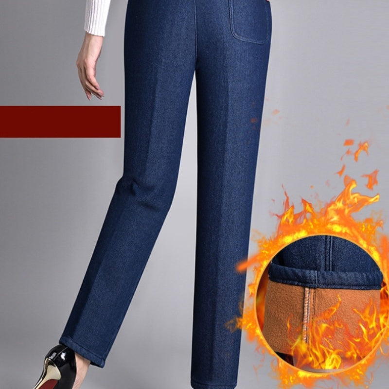 Jean femme bleu confortable, coupe droite, taille élastique. Parfait pour toutes les saisons et un style décontracté.