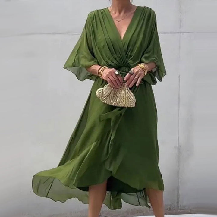 Robe femme midi chic, fluide, décolleté V et ceinture. Idéale pour soirée ou tenue de jour élégante.