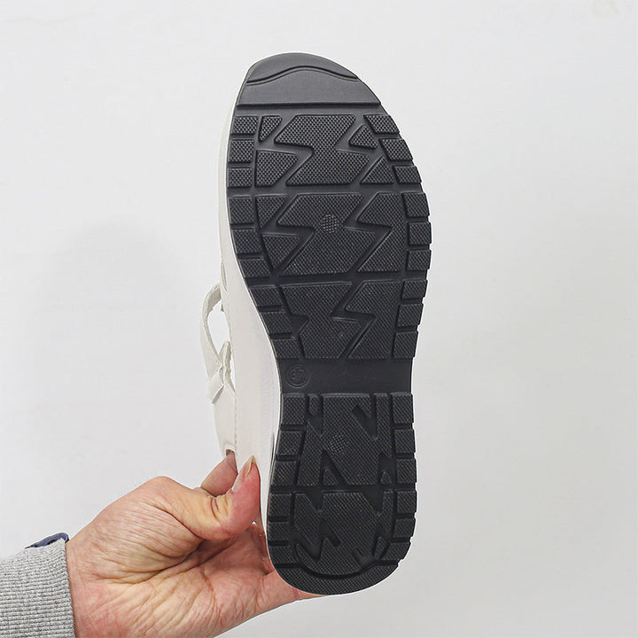 Sandales compensées élégantes pour femme, respirantes, confort et style chic d'été.