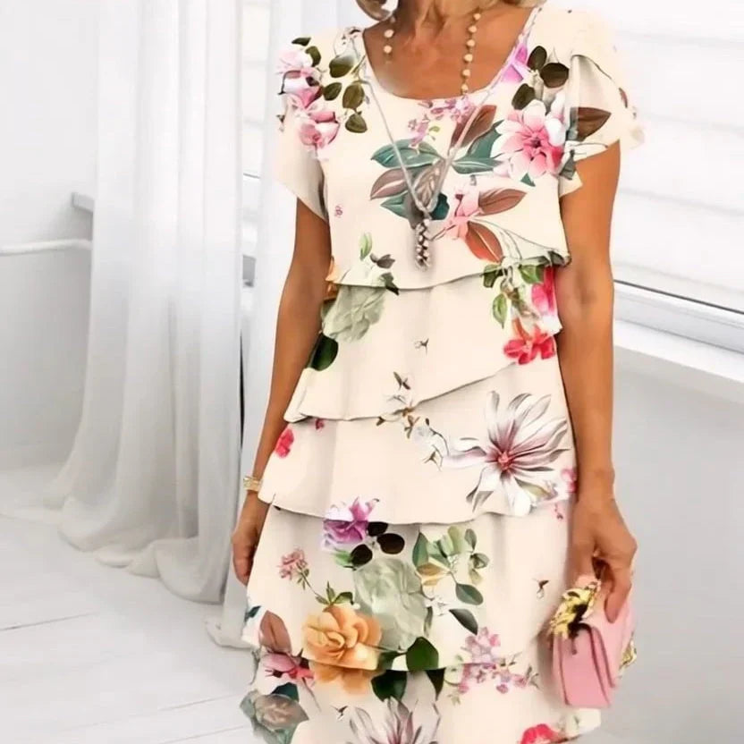 Robe fleurie femme à volants, fluide et confortable, idéale pour l'été et le printemps.
