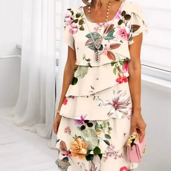 Robe fleurie femme à volants, fluide et confortable, idéale pour l'été et le printemps.
