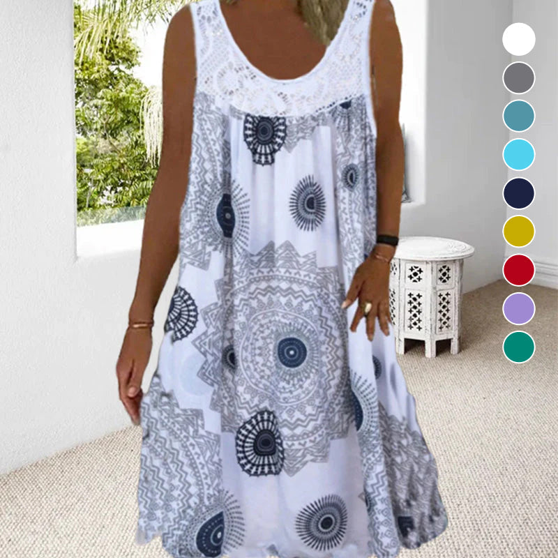 Robe ample femme, motifs estivaux, matière polyester fluide, finitions en dentelle.